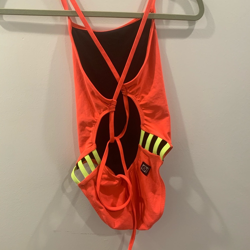 neon orangey/pink and yellow jolyn one piece
